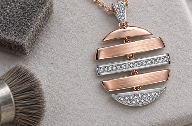 Pendant with brushed and polished segments being finished with a brush wheel
