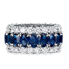 Ring with blue colored CZ stones and white pave accents