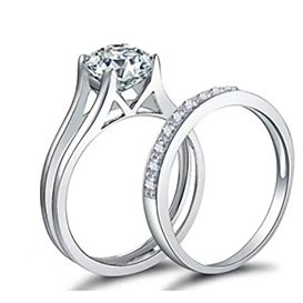 Two stackable sterling silver CZ rings