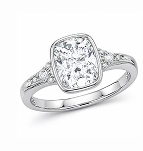 Geometric bezel ring with bold cushion moissanite center stone