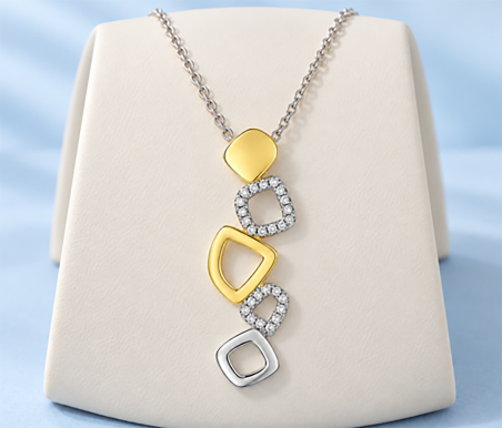 Private label necklace with three stone-set pendants on a fine chain