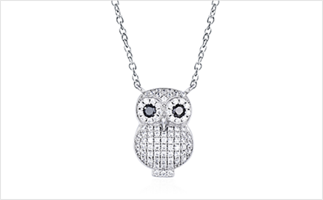 Owl pendant with pav&eacute; set body on a fine silver chain