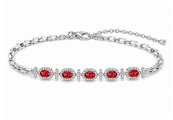 Silver chain bracelet set with red stone stations and a lobster clasp